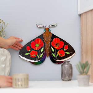 Stained glass moth wall decor with red poppy flowers and dark iridescent wings