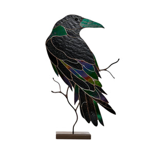 Handcrafted stained glass raven sculpture with metal branch base for table decor