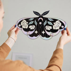Iridescent stained glass moth wall hanging with floral rose and leaf details