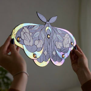 Iridescent stained glass moth wall hanging with floral rose and leaf details