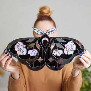 Iridescent stained glass moth wall hanging with floral rose and leaf details