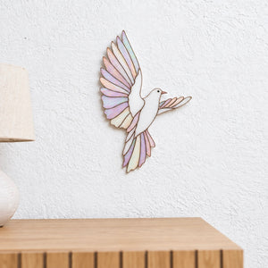 Iridescent stained glass dove wall decor symbolizing peace and hope