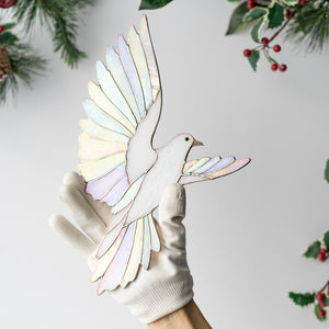 Iridescent stained glass dove wall decor symbolizing peace and hope