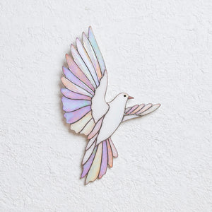 Iridescent stained glass dove wall decor symbolizing peace and hope