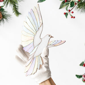 Iridescent stained glass dove wall decor symbolizing peace and hope