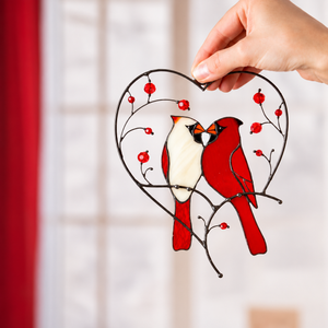 Cardinal couple stained glass suncatcher with heart-shaped metal frame, red berries, and two birds