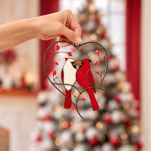 Cardinal couple stained glass suncatcher with heart-shaped metal frame, red berries, and two birds