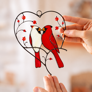 Cardinal couple stained glass suncatcher with heart-shaped metal frame, red berries, and two birds