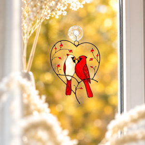 Cardinal couple stained glass suncatcher with heart-shaped metal frame, red berries, and two birds