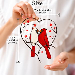 Cardinal couple stained glass suncatcher with heart-shaped metal frame, red berries, and two birds